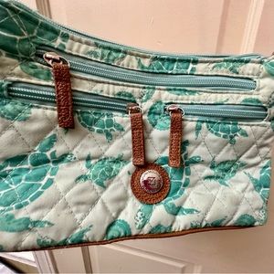 Stone Mountain crossbody. Turtle pattern in shades of green.